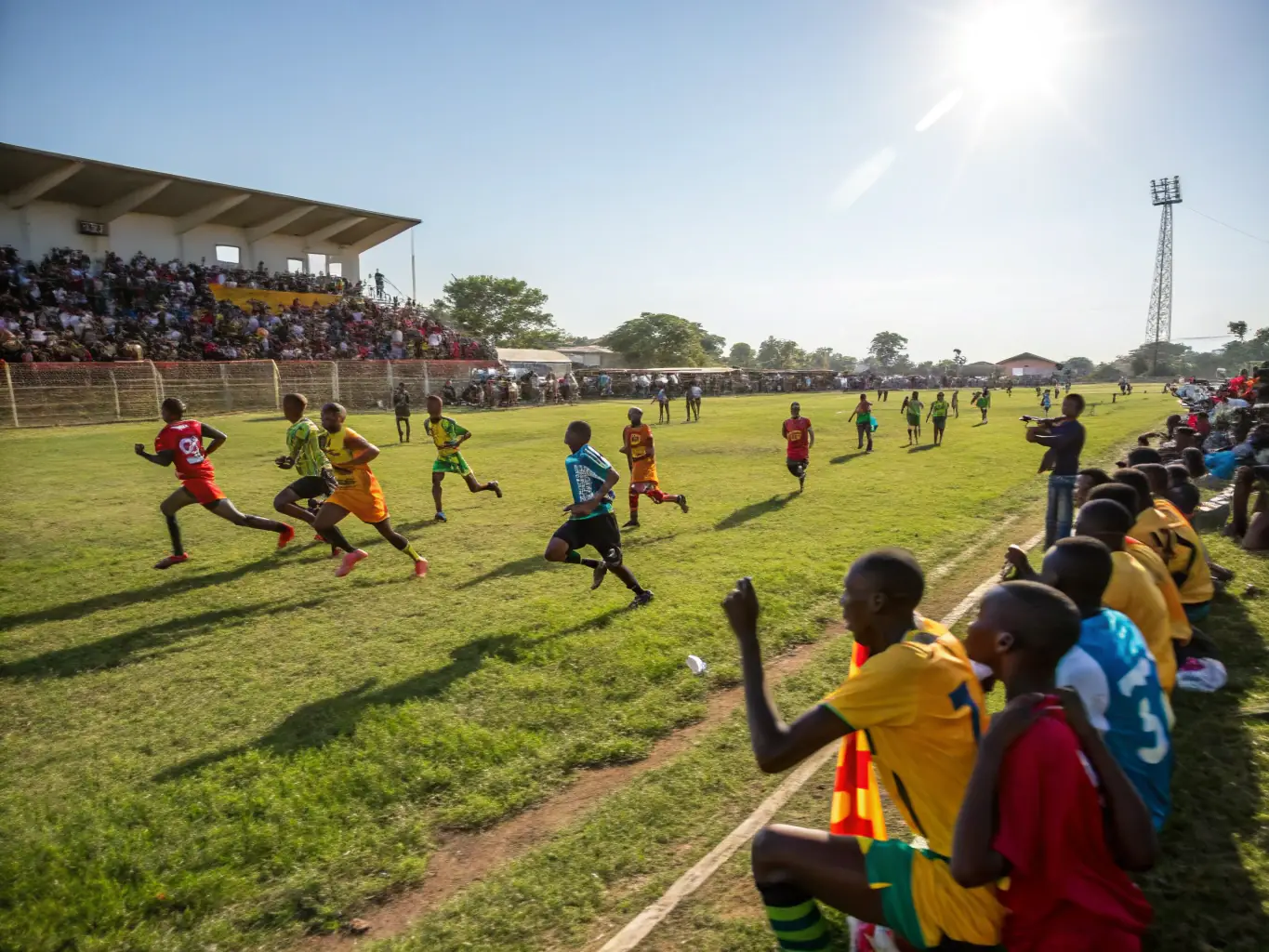 A photo of a RUFFIAC MALESTROIT FOOT team participating in a local football match, demonstrating the club's competitive spirit and community involvement. The players are wearing the club's official jersey and are focused on the game.